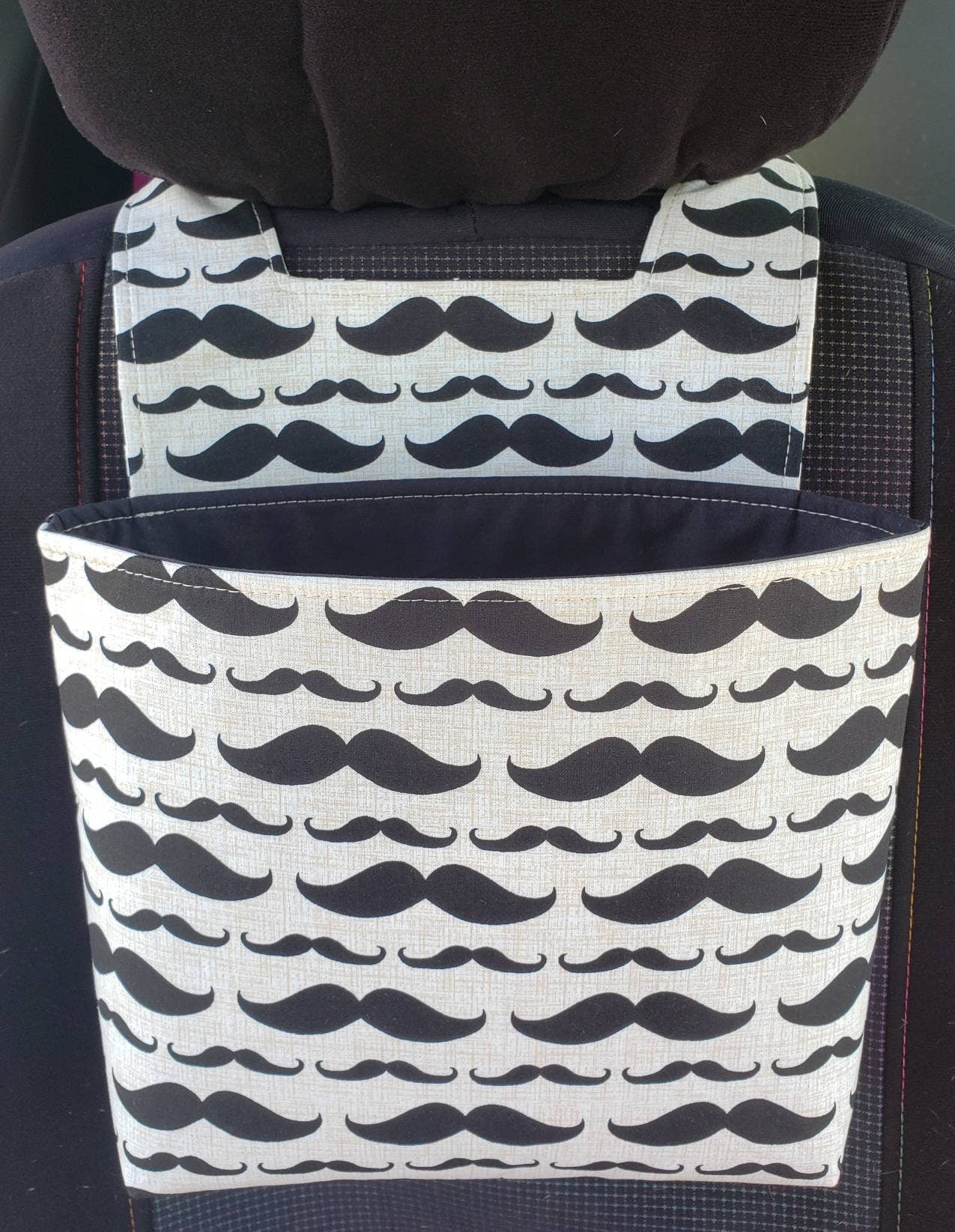 Mustaches // car trash can