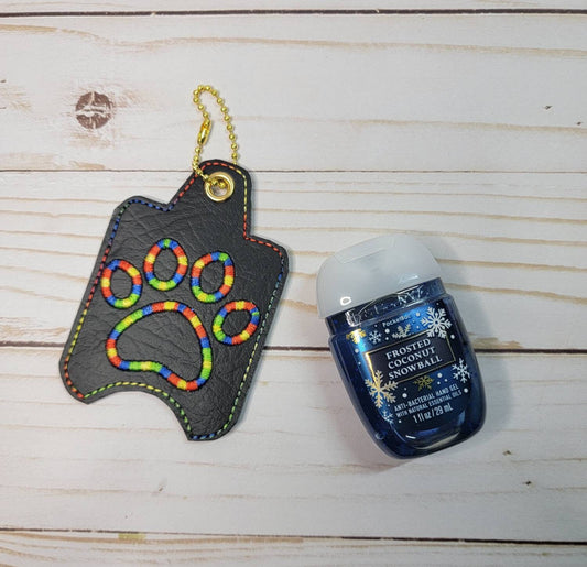 Variegated rainbow paw print// Hand sanitizer holder/ keychain/ embroidered