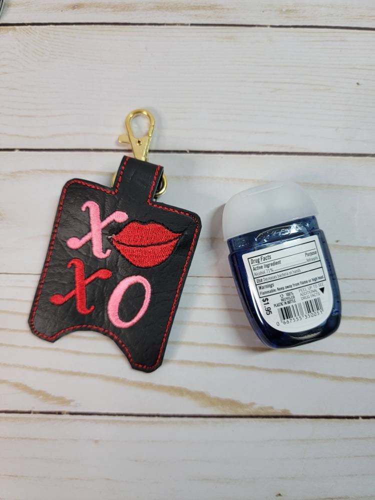 XoXo lips/Hand sanitizer/ snap tab keychain/ embroidered design